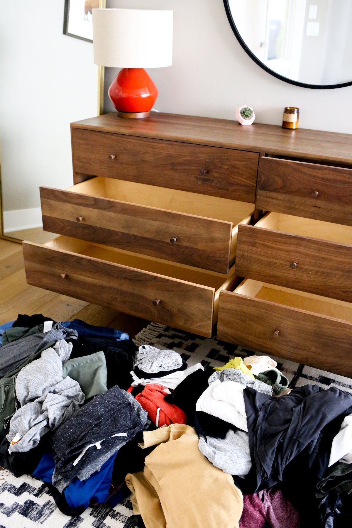 Dresser with clothing for capsule wardrobe