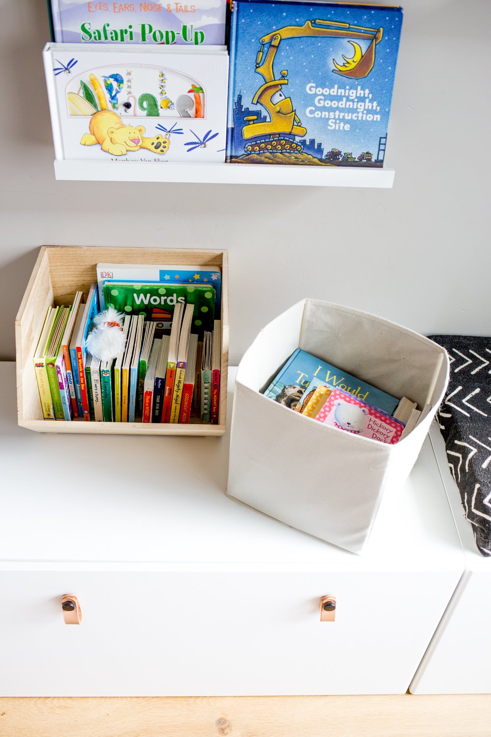 two bins of organized kids books