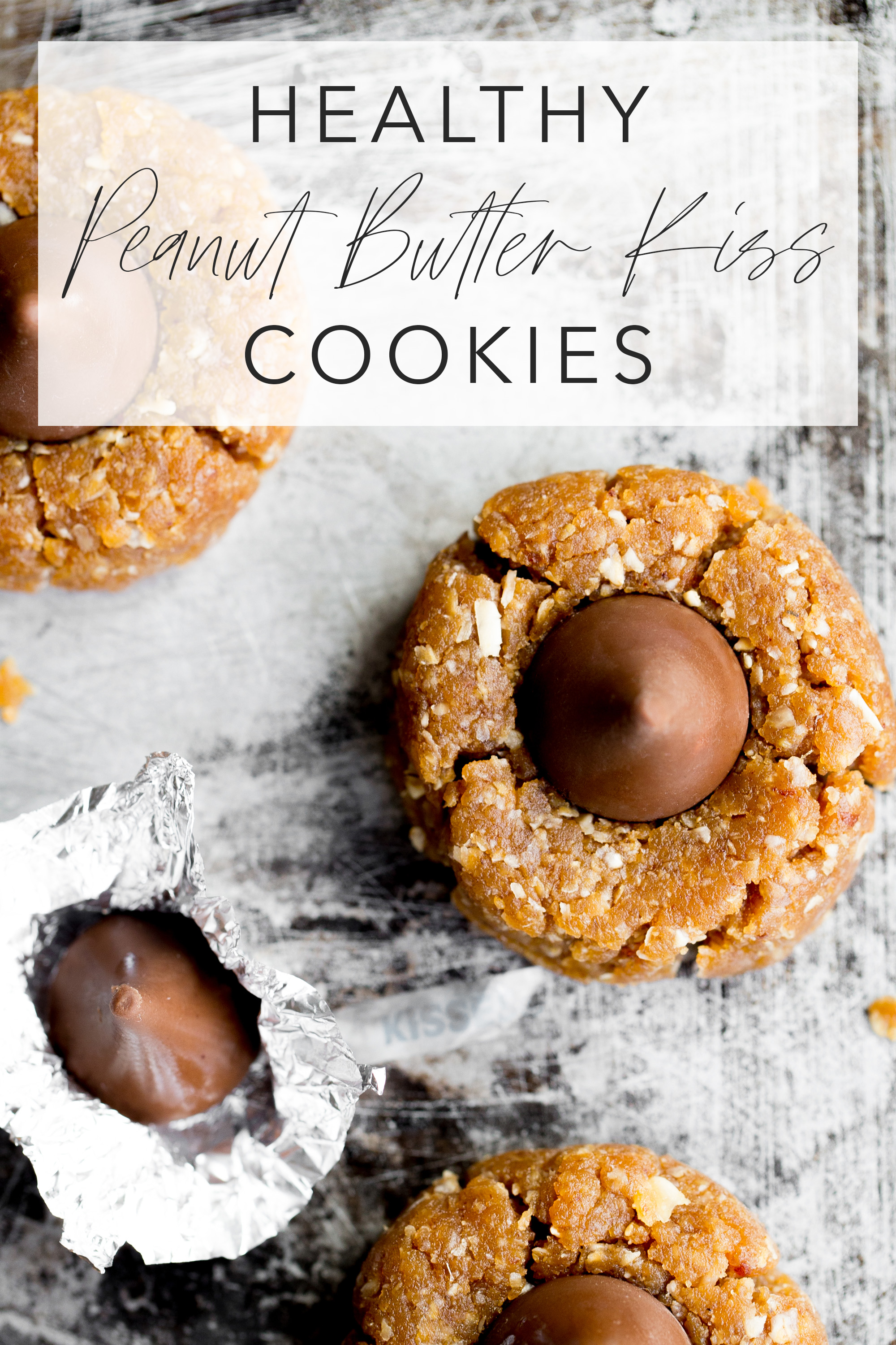 top down photo of healthy peanut butter kiss cookie on sheet pan with title text overlay