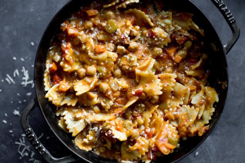 bowtie pasta with chickpeas in a dutch oven