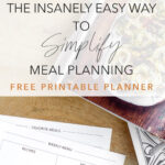 how to simplify meal planning modern minimalist meal planner pages with cookbook and plant on a wood table with title text overlay