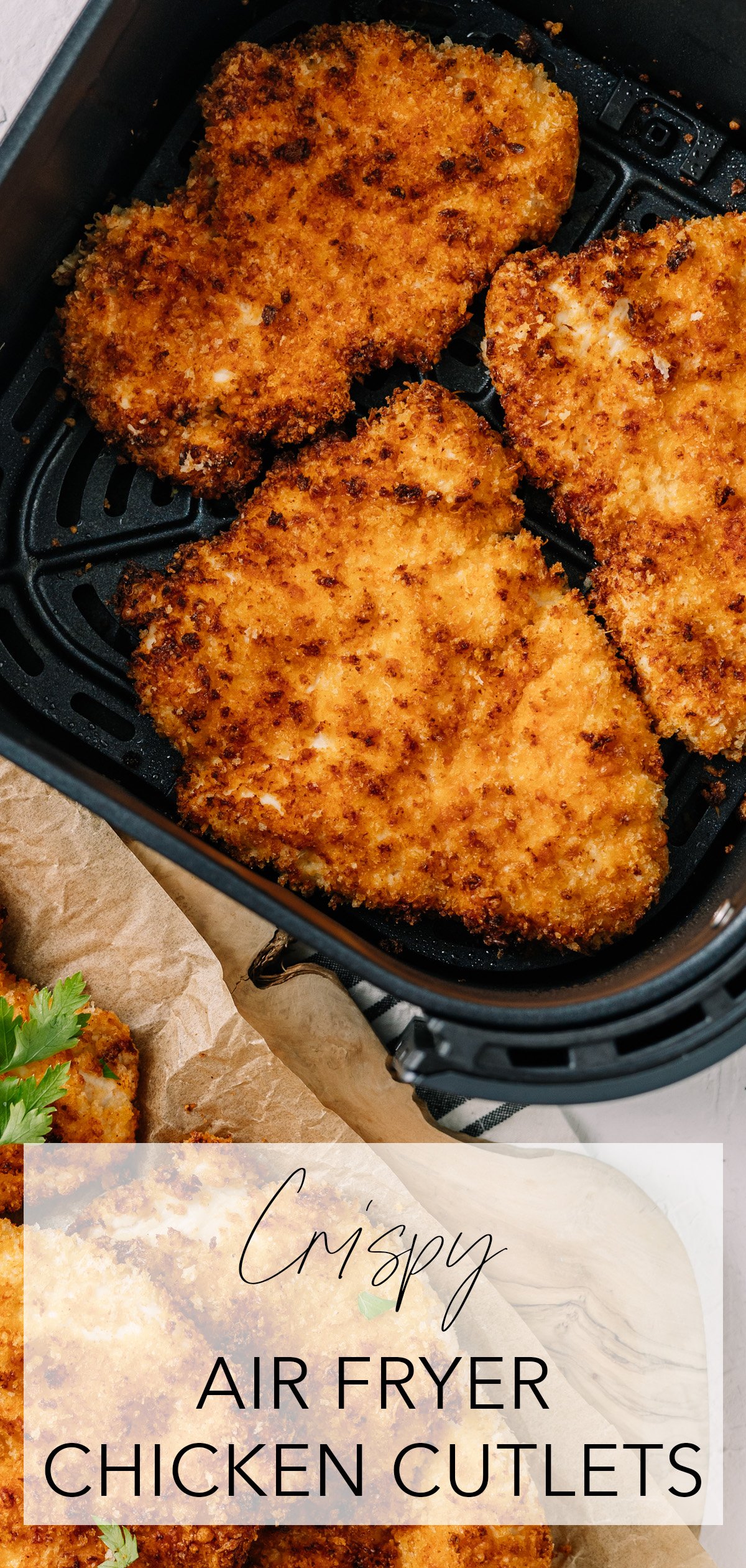 Top-down image of crispy, golden chicken cutlets in air fryer basket with title text overlay